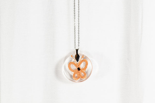 APRICOT ORANGE BUTTERFLY PENDANT IN THE SHAPE OF LACE