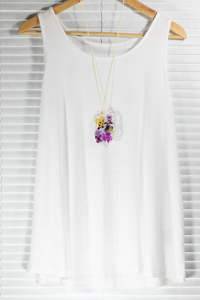 YELLOW BUTTERFLY PENDANT ON PURPLE FLOWERS