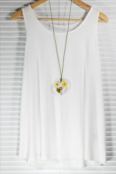 PENDANT OF YELLOW BUTTERFLY ON A SUNNY MEADOW