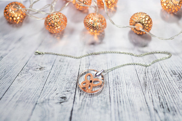 APRICOT ORANGE BUTTERFLY PENDANT IN THE SHAPE OF LACE