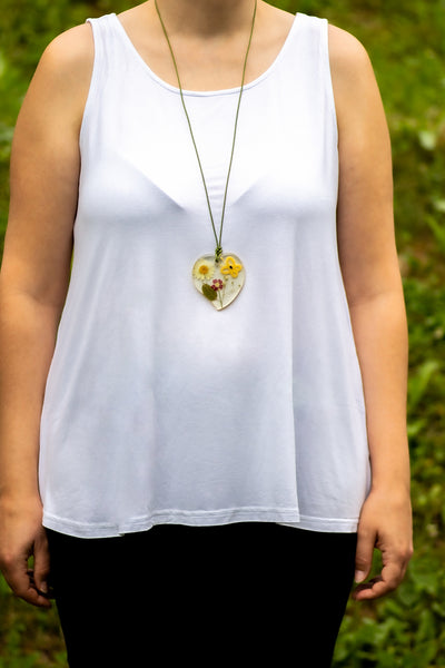 PENDANT OF YELLOW BUTTERFLY ON A SUNNY MEADOW