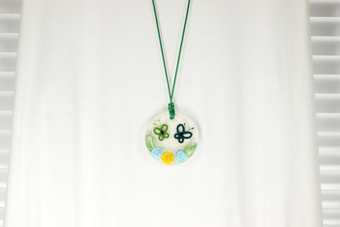 ROUND PENDANT GREEN BUTTERFLY ON YELLOW BLUE ROSES