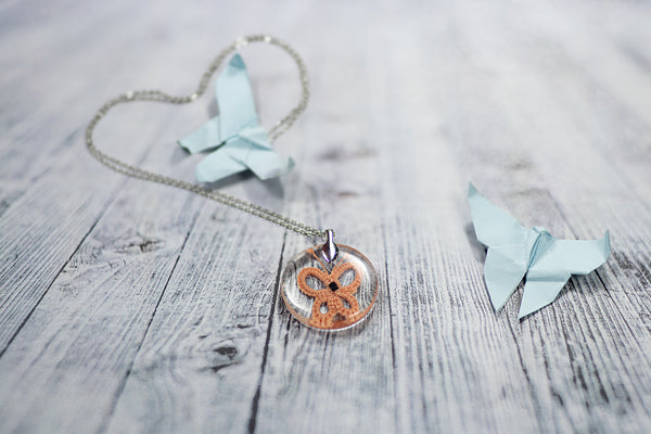 APRICOT ORANGE BUTTERFLY PENDANT IN THE SHAPE OF LACE